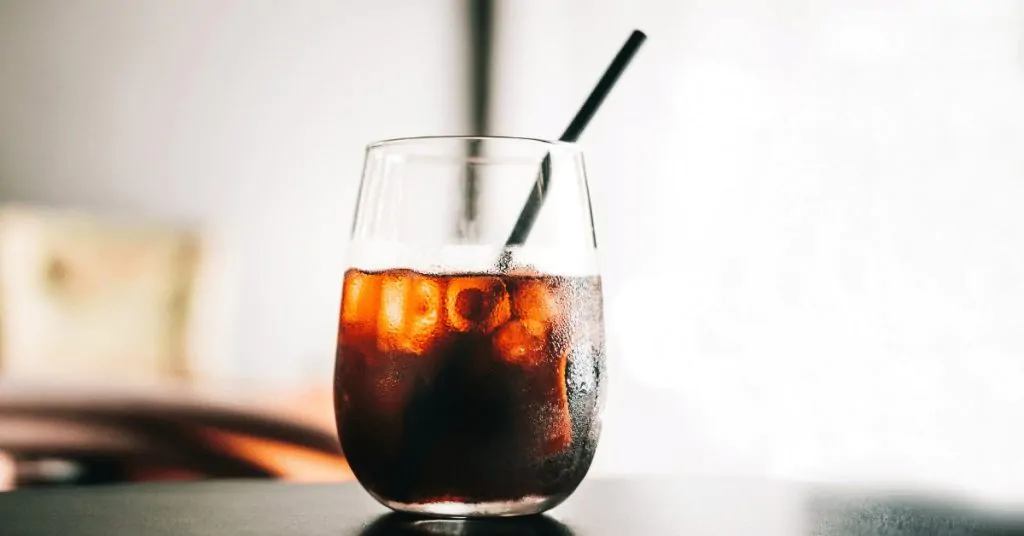 cold brew in glass with straw