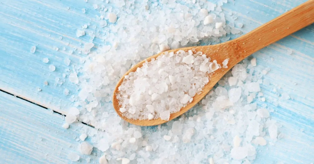 rock salt on a wooden spoon