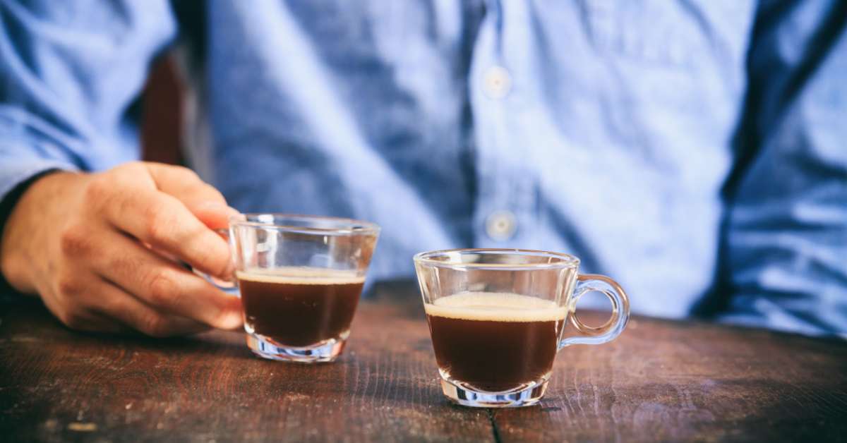 man tasting coffee