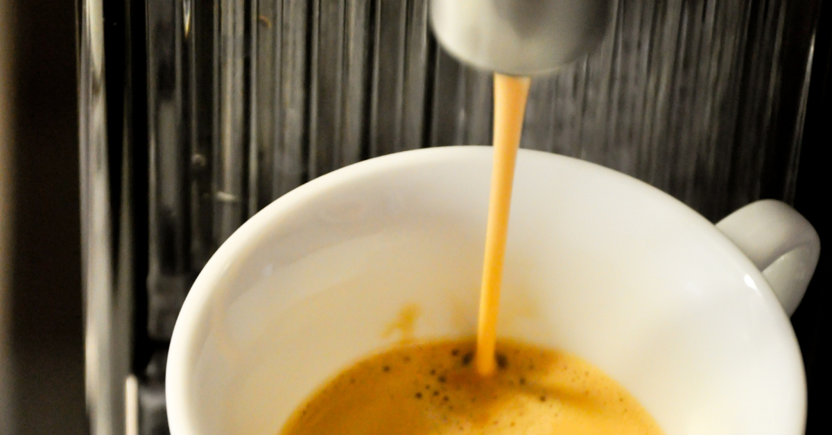 pouring coffee from machine