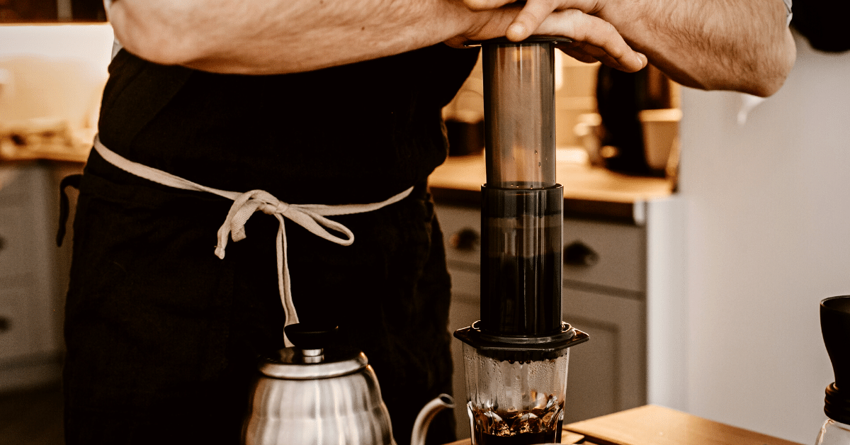 barista preparing aeropress coffee