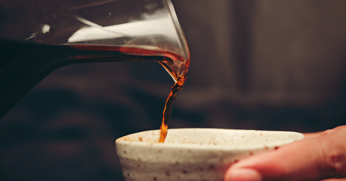 pouring coffee in a cup