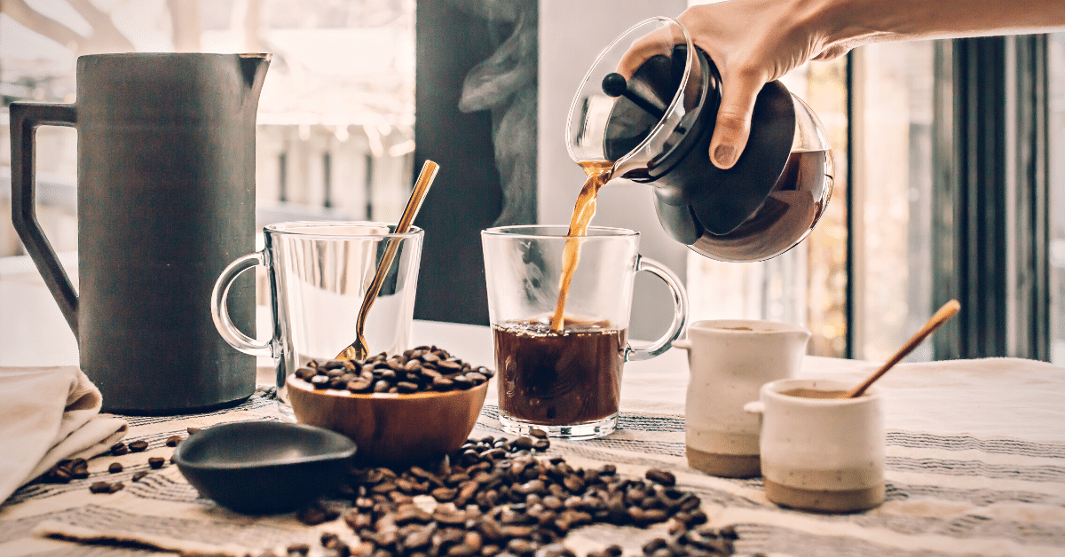 a person pouring coffee