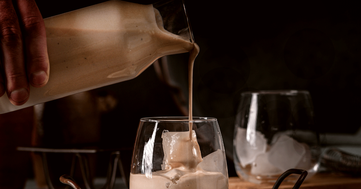 pouring irish cream into glass