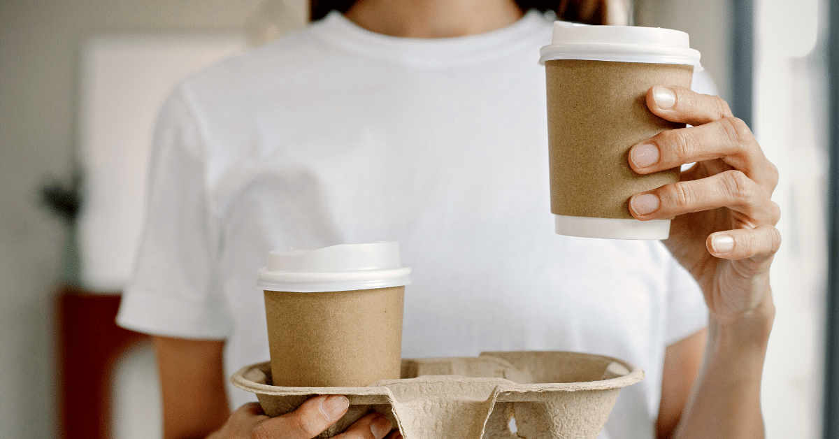 woman holding coffee