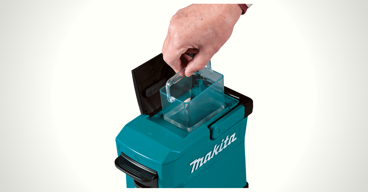 person using makita coffee maker