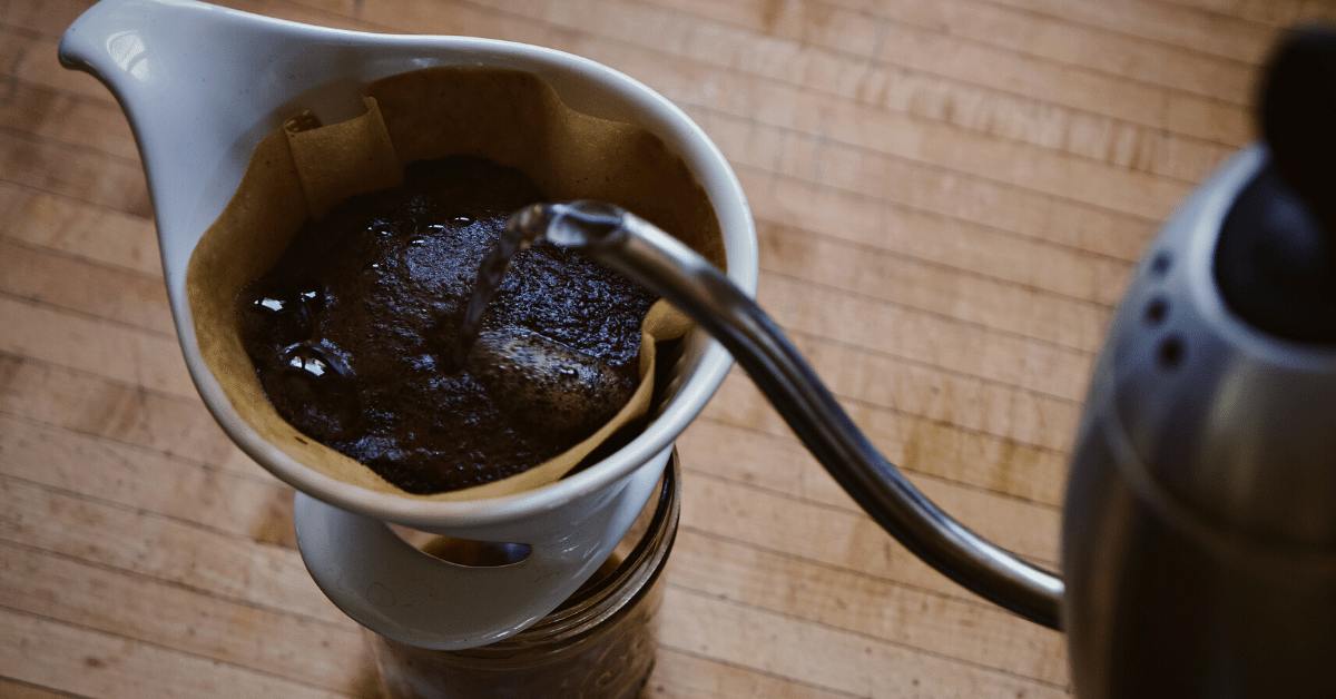 pouring water over coffee filter