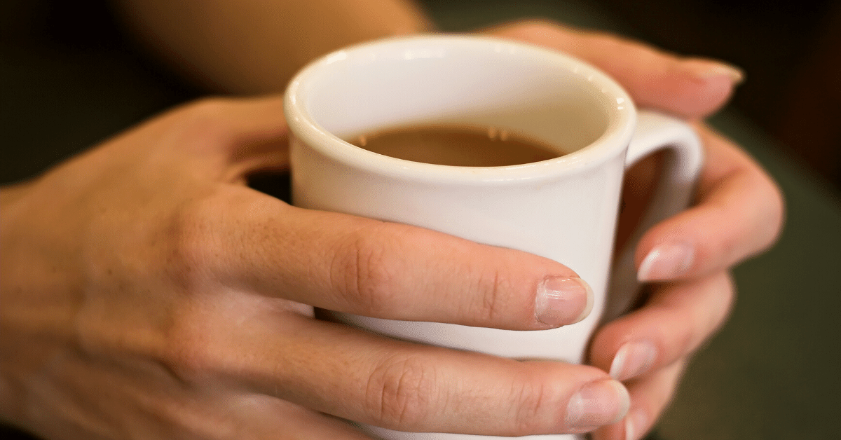 woman holding coffee