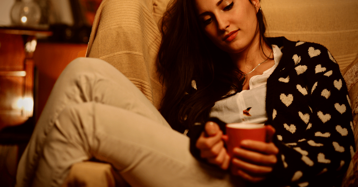 woman drinking coffee in the evening