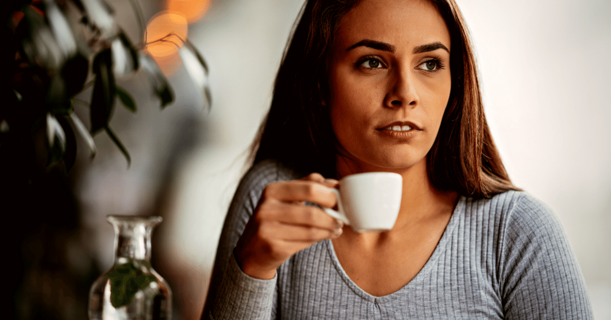 woman drinking espresso