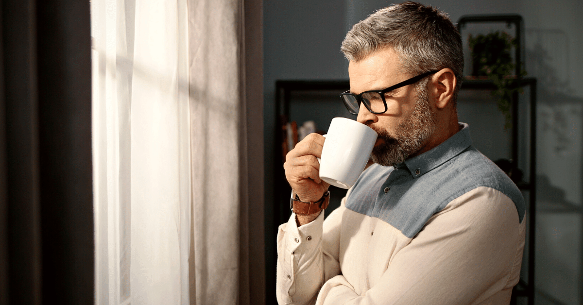 man drinking coffee