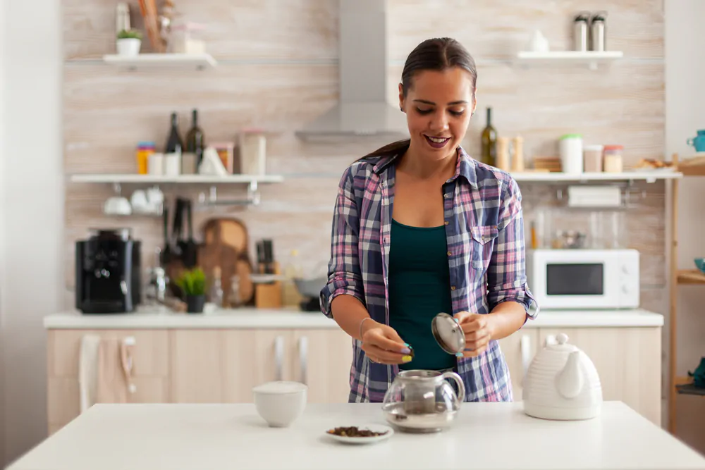 woman preparing tea